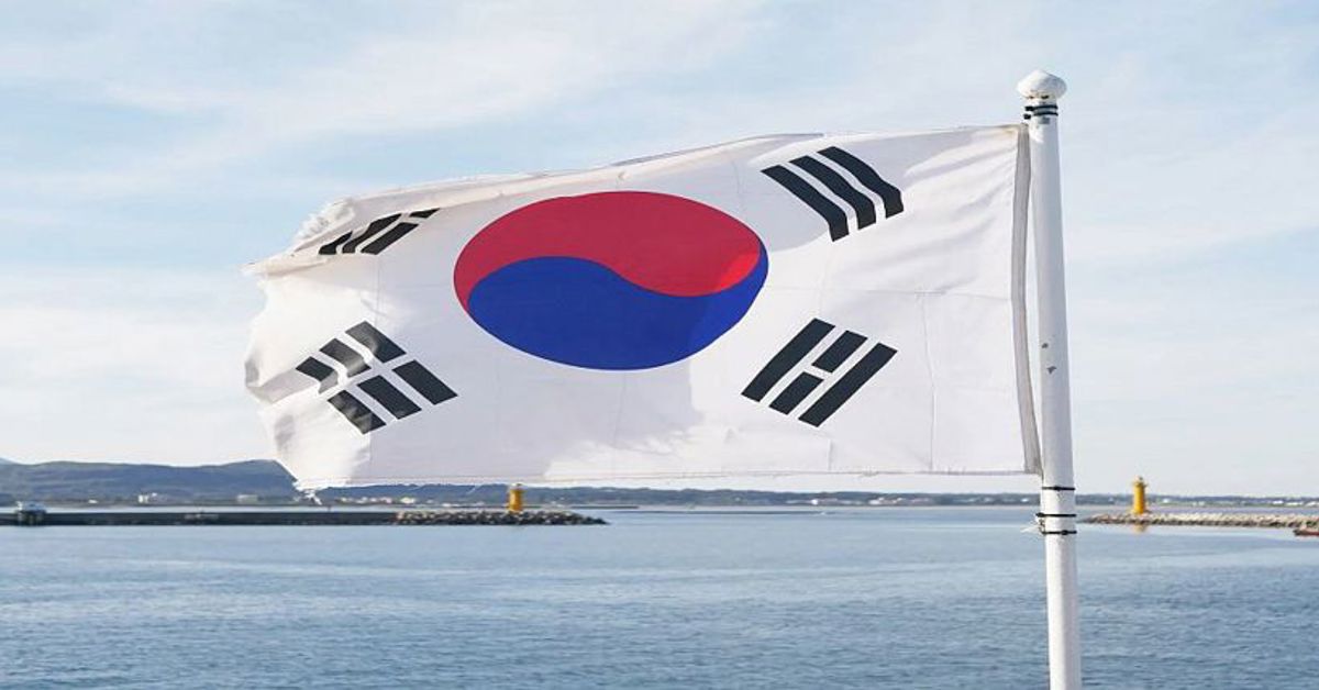The South Korean flag flying from a mast