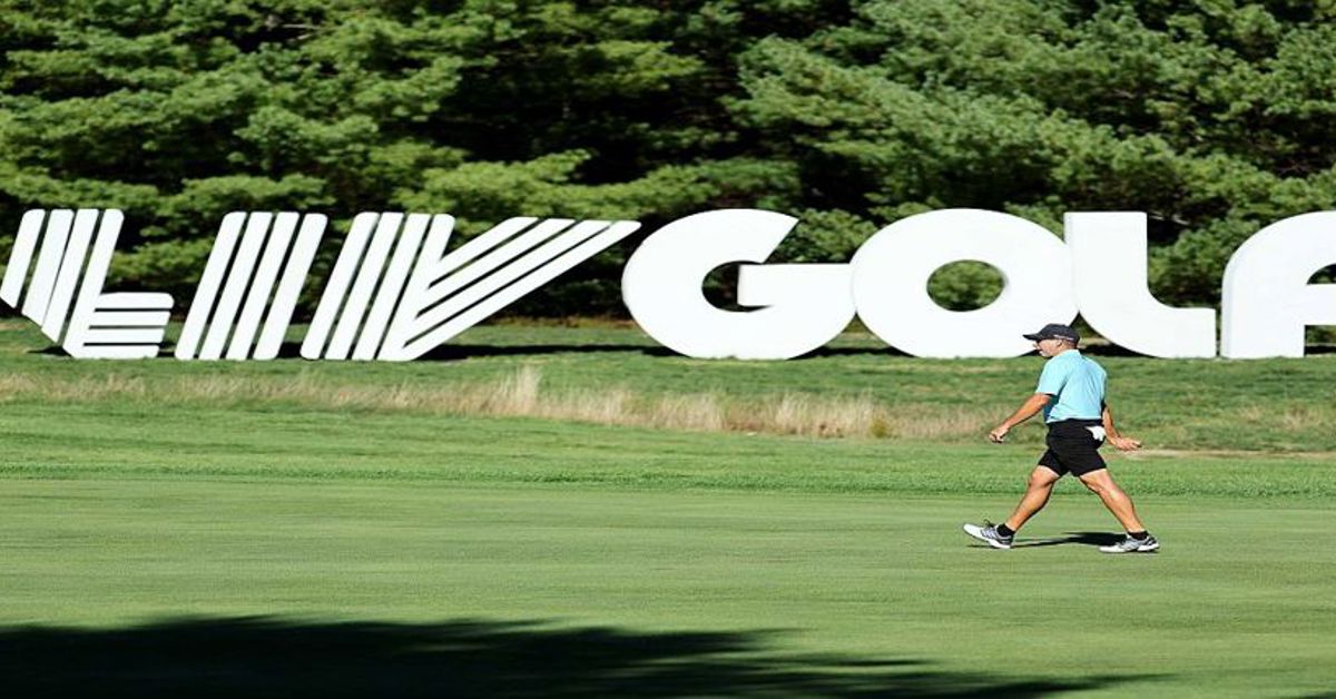 A sign promoting LIV Golf on a golf course